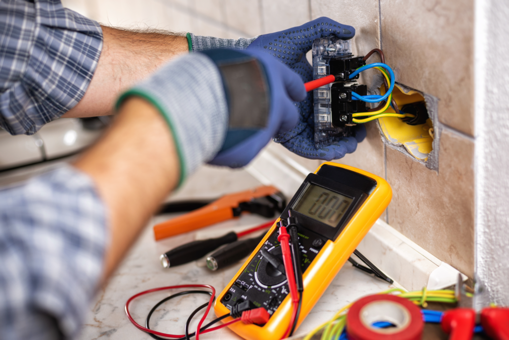 Electrician installing outlet in Cleveland Ohio